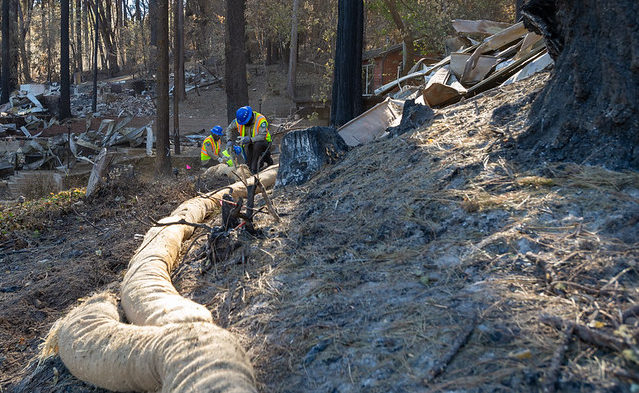 CCC crews install wattles in a burn scarred area of Berry Creek